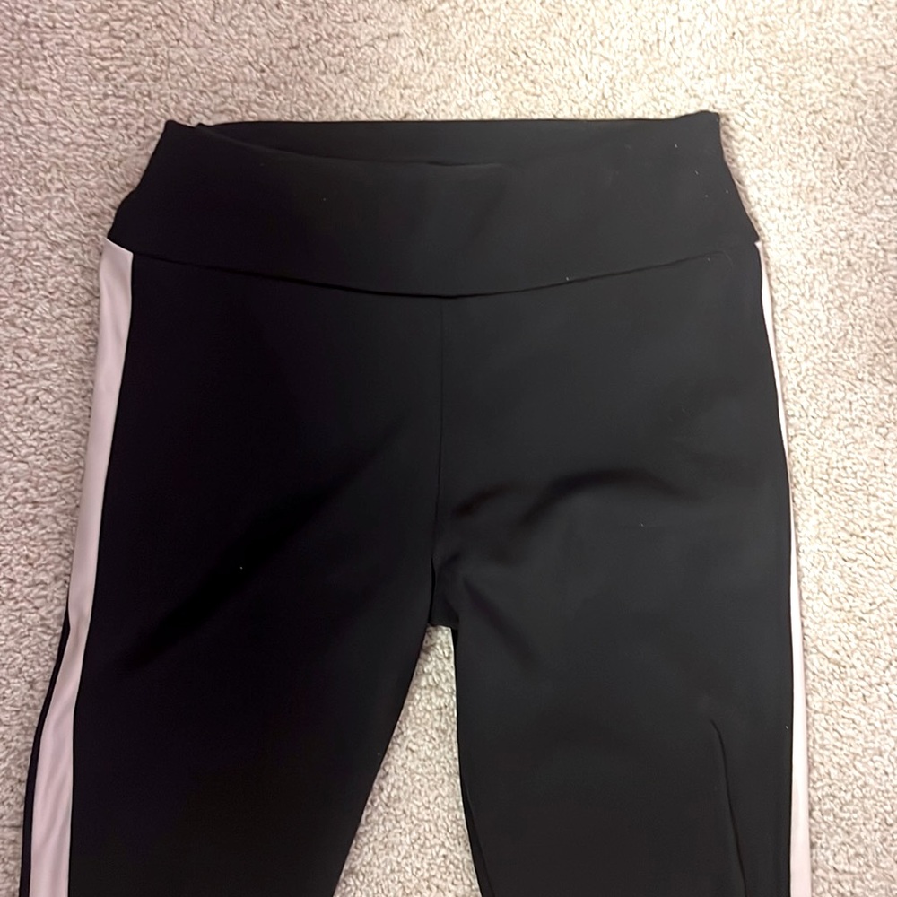Black pants with leather stripes on the side